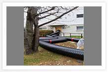 Ducting for the desiccants using an exterior door, then up the staircase.